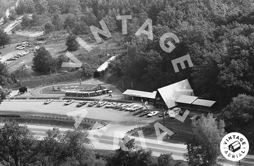 Prehistoric Forest - Aerial Photo Of Lodge And Parking Lot